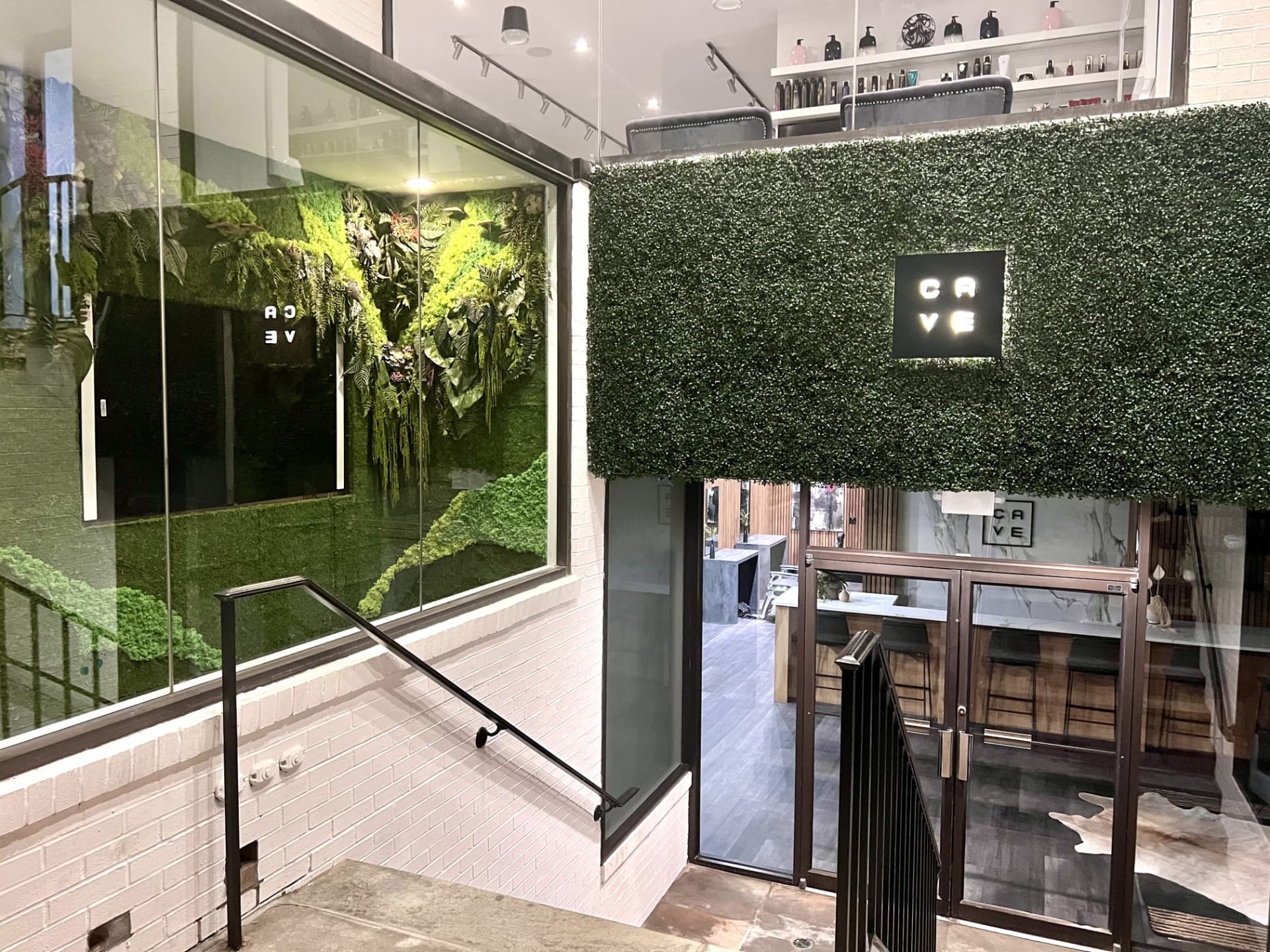 CAVE barbershop entrance and living green wall